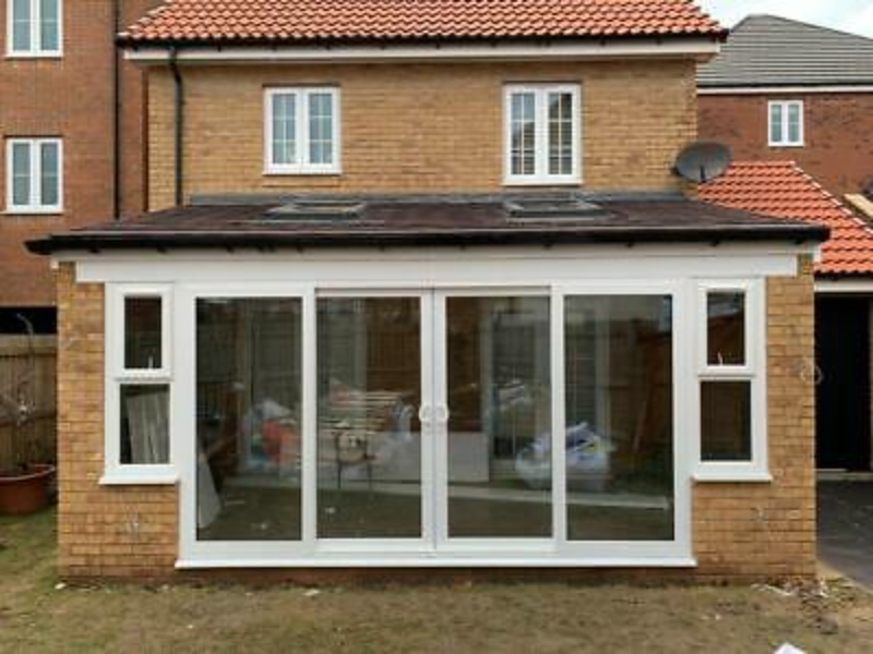 house with lean to conservatory